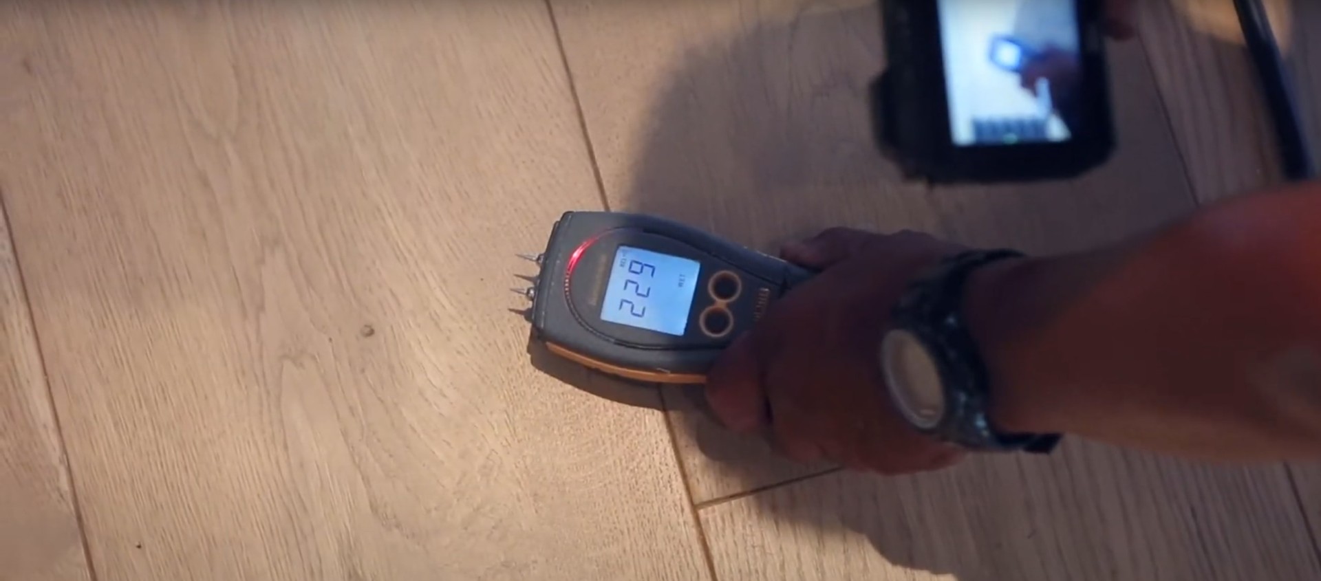 Professional moisture detection and monitoring equipment for accurate water damage assessment Moisture detection equipment showing humidity readings during water damage assessment